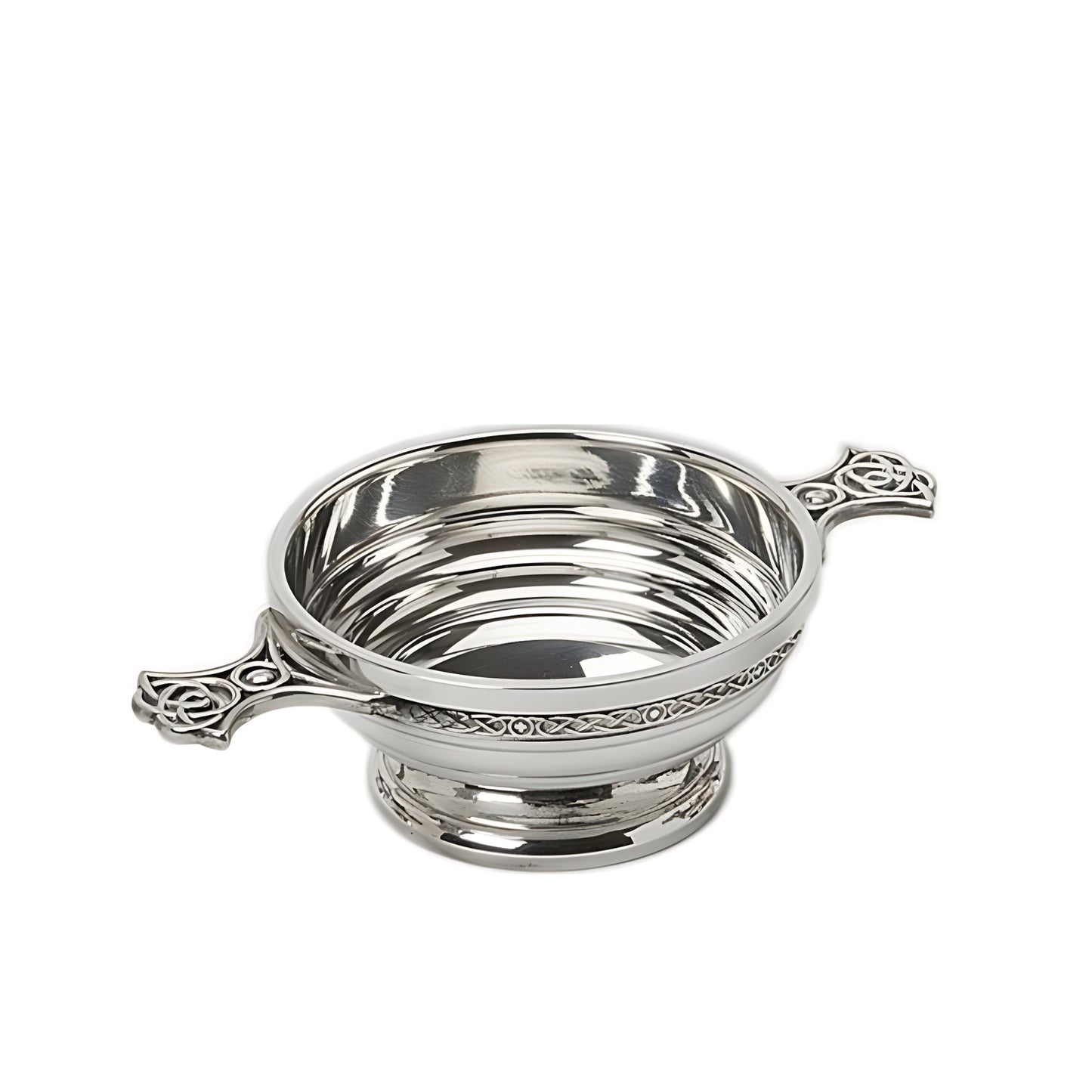 Silver 4-inch ribbed quaich bowl with Celtic handles, used as a decorative drinking cup.