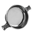 Pewter quaich bowl with Celtic knot handles, ideal as a Scottish gift.
