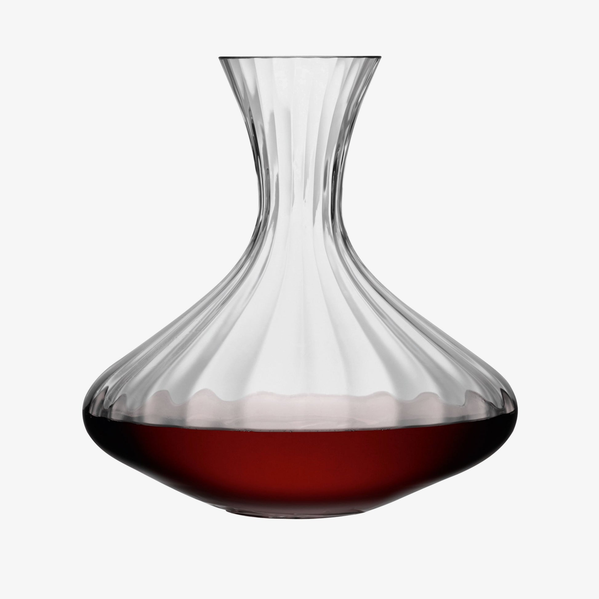 Elegant glass wine decanter with red wine in Aurelia carafe.