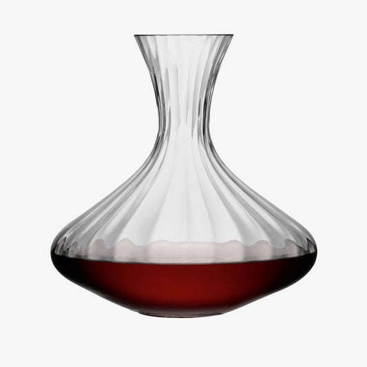 Elegant glass wine decanter with red wine in Aurelia carafe.