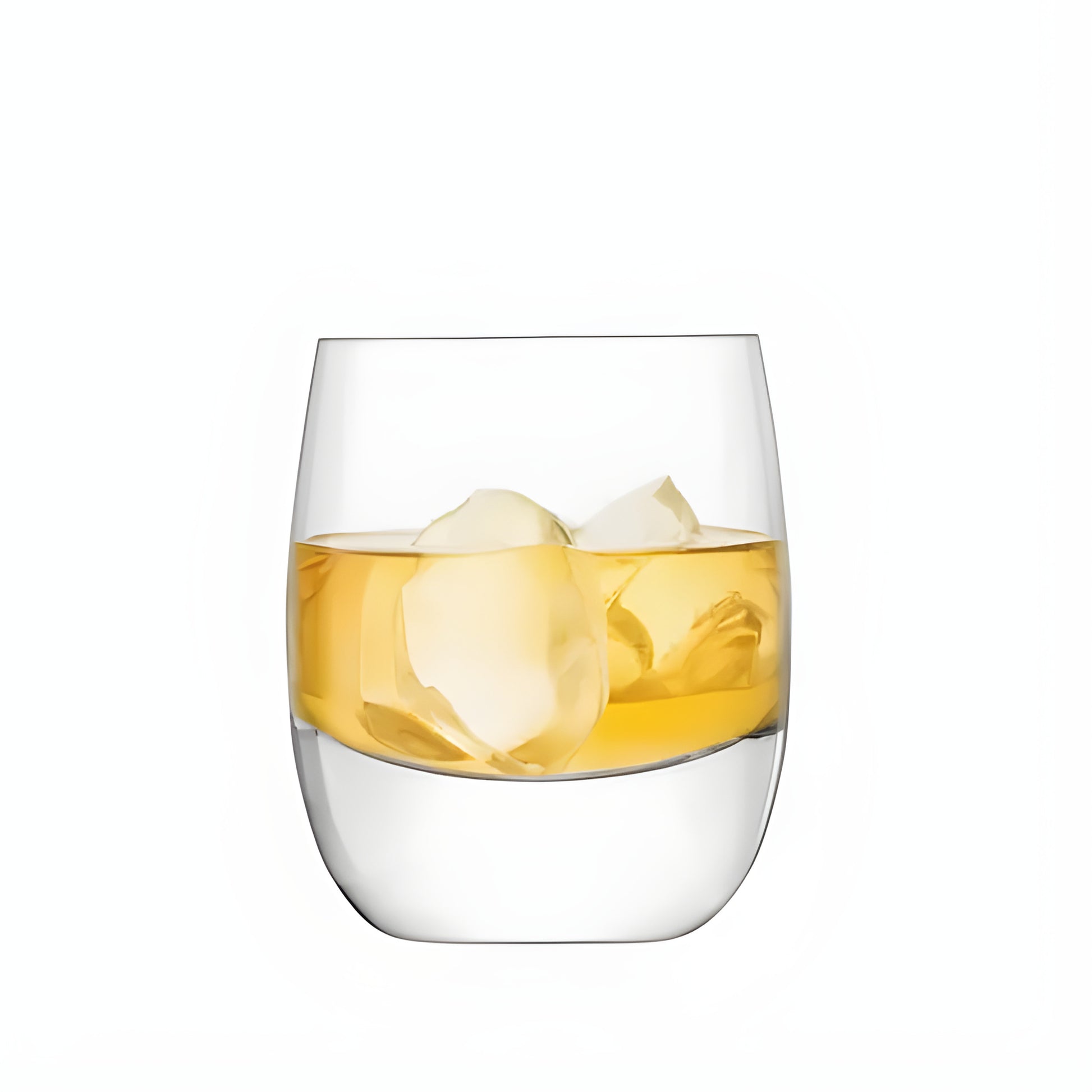 Whisky tumbler with ice cubes and whisky on a white background.