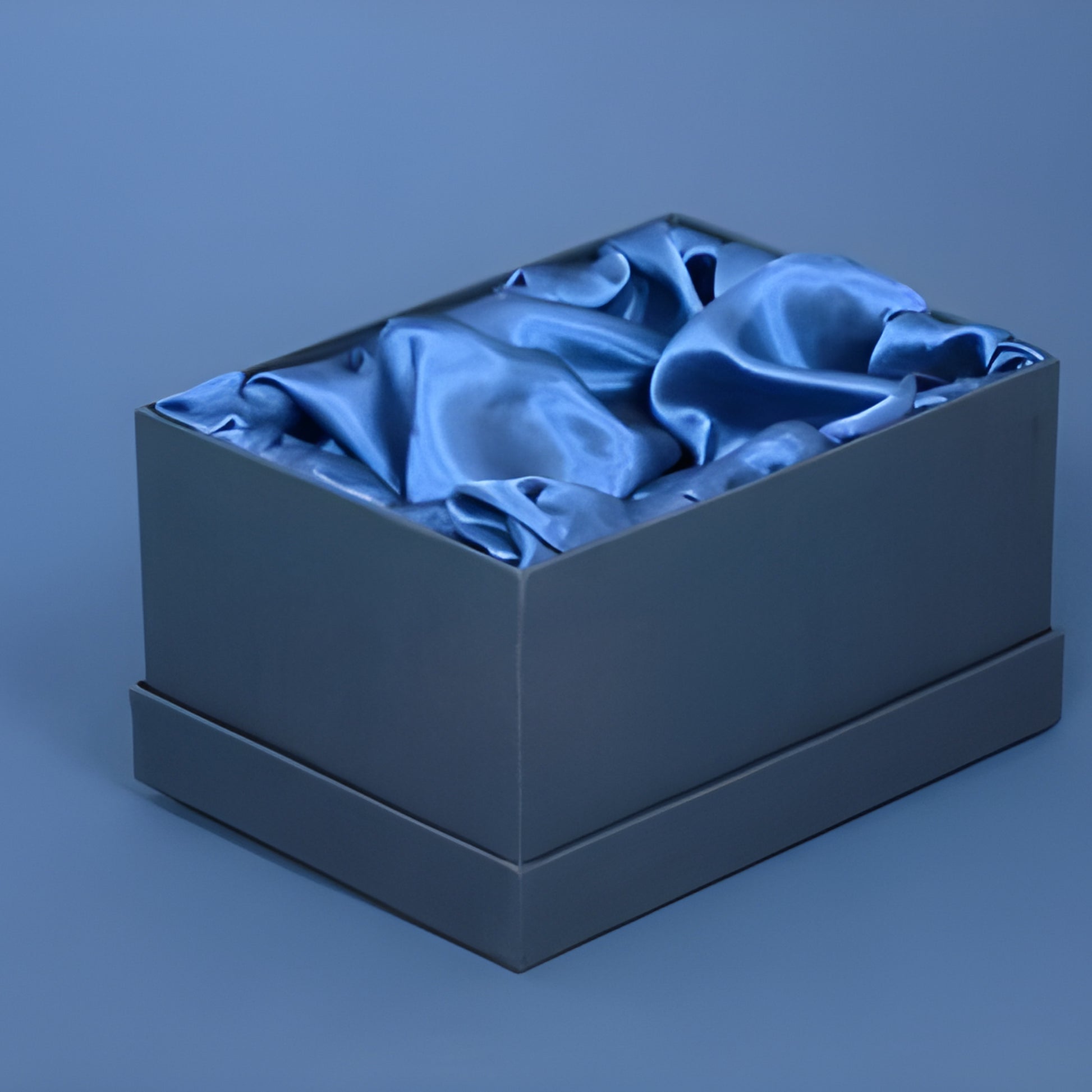 Luxury blue gift box with silk lining for tumbler glasses.