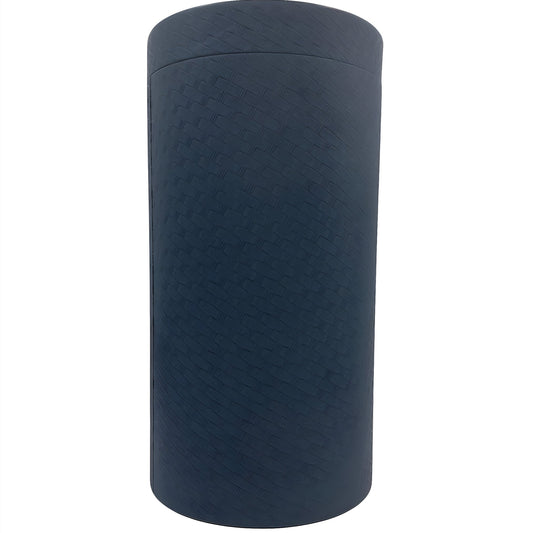 Textured blue cylindrical box for gin glass packaging.