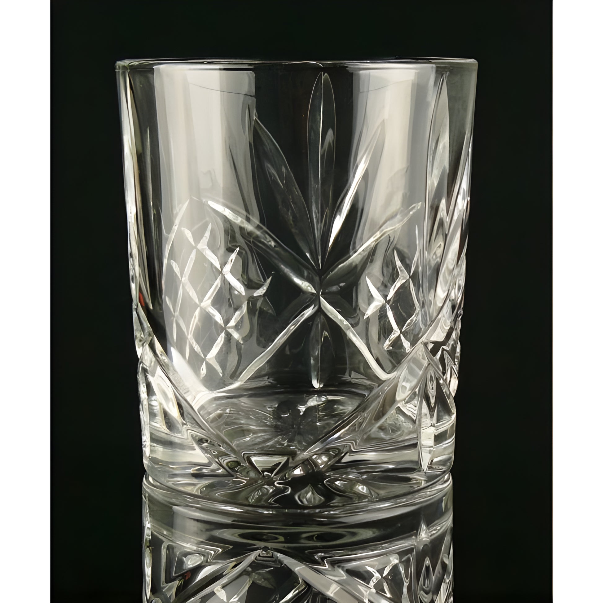 Crystal clear dublin cut whisky glass with patterned design.