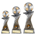 Antique silver and gold football trophies with engraving plaques.