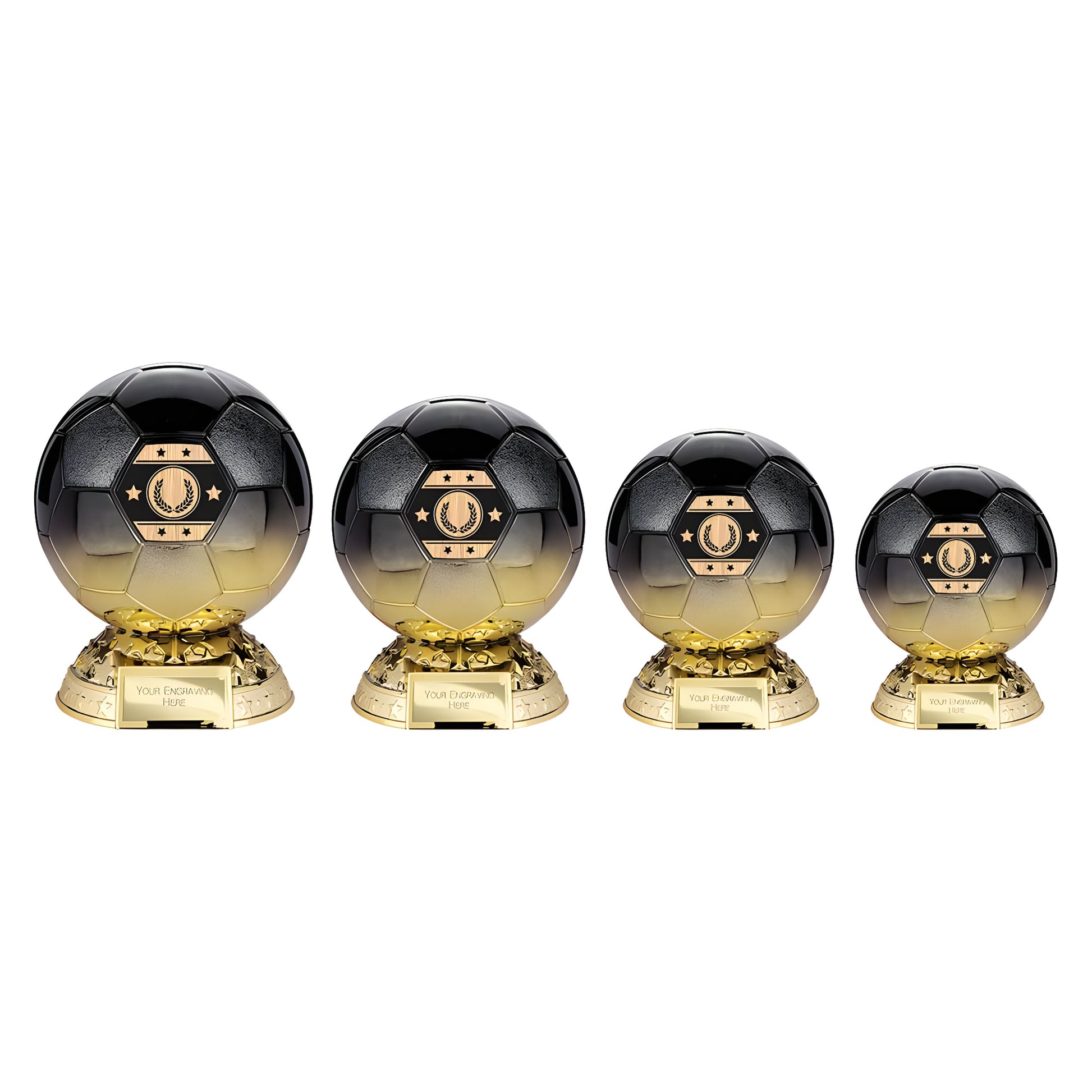 Set of carbon black to gold soccer ball trophies with engraved plaques.