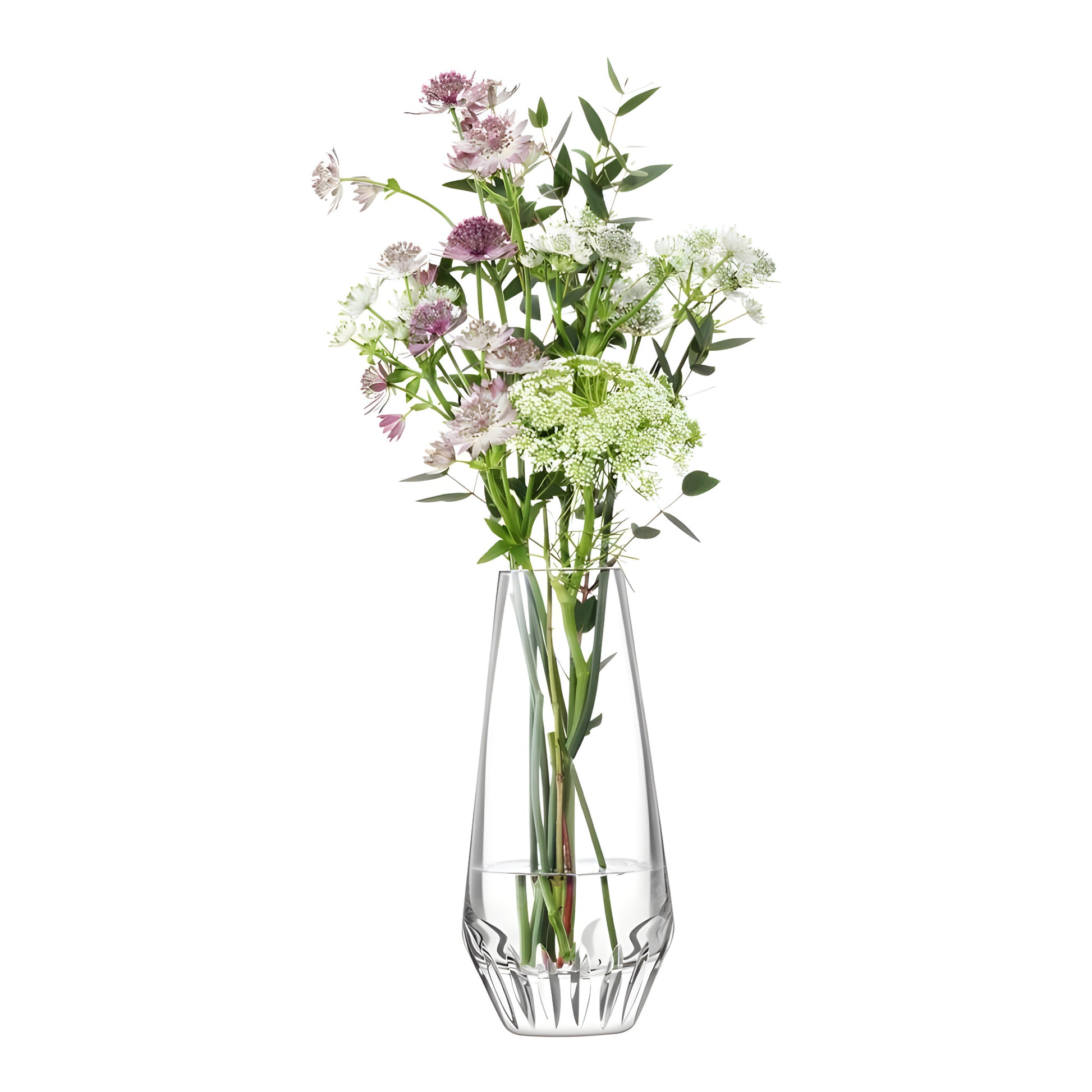 Clear glass vase with mixed cut flowers bouquet including pink and white blooms.
