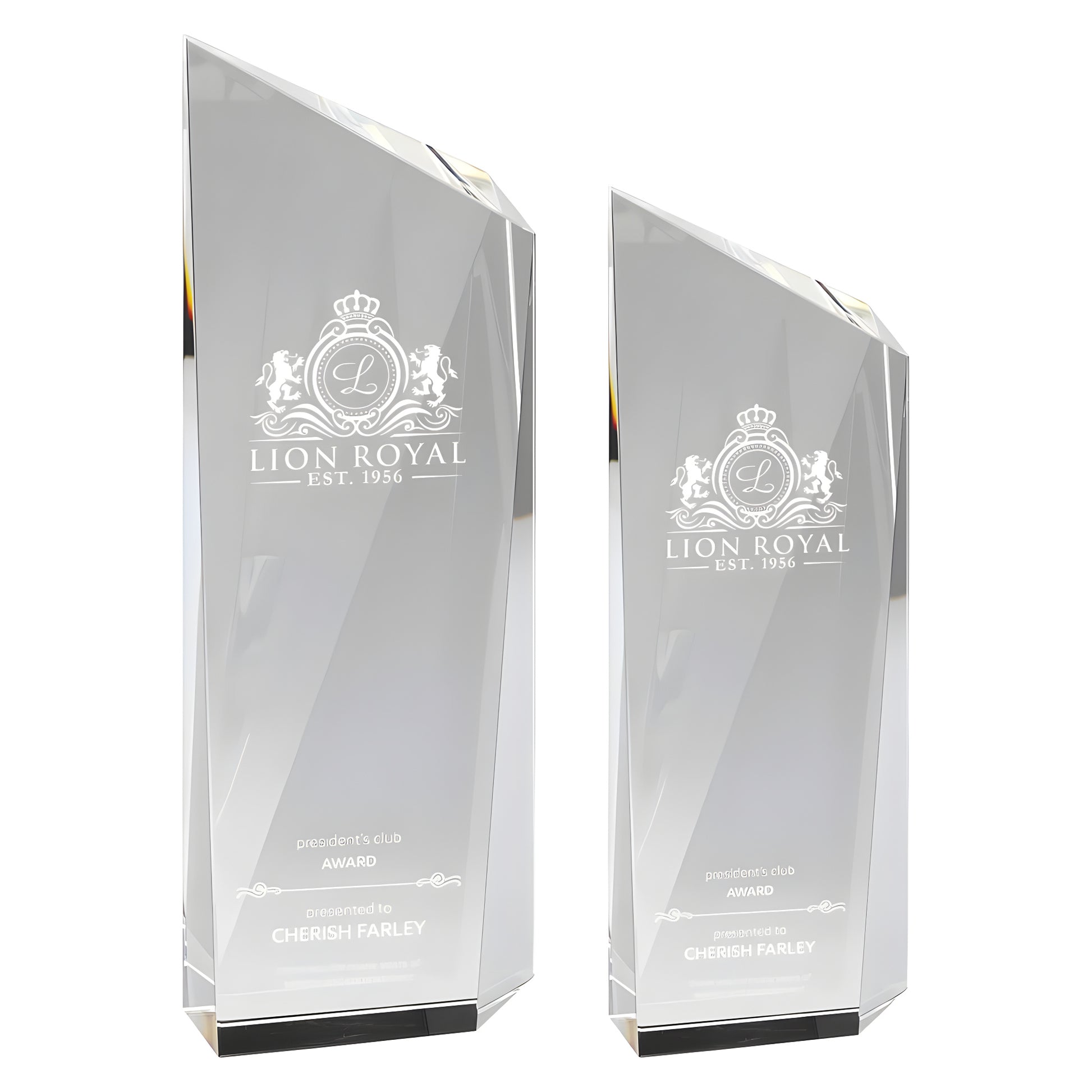 Two Glacier Peak glass awards with Lion Royal logo and President's Club engraving.
