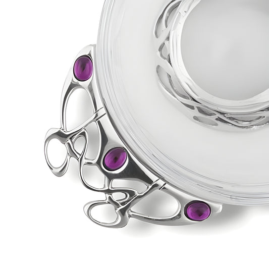 Elegant glass and pewter quaich bowl with purple stones in Celtic design.