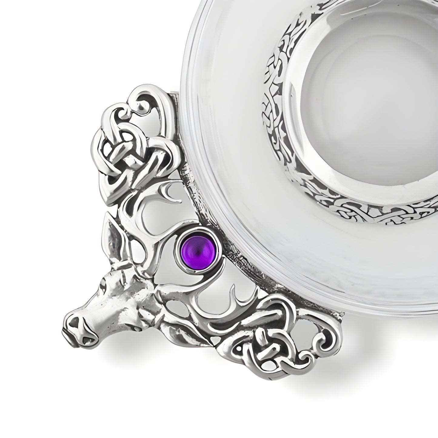 Glass stag quaich with Celtic design and purple gemstone.