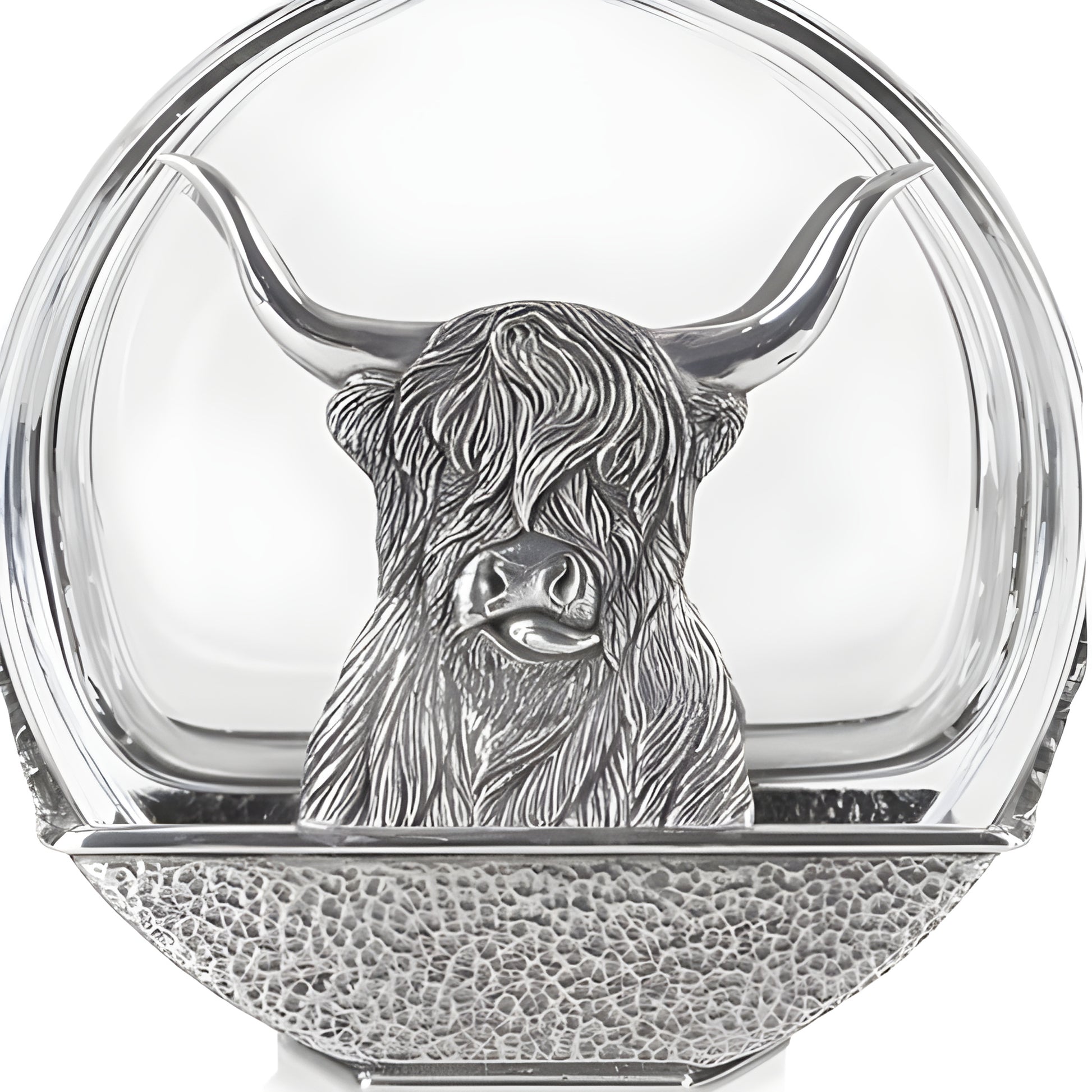 Silver highland cow decanter with glass bottle and Scottish design.