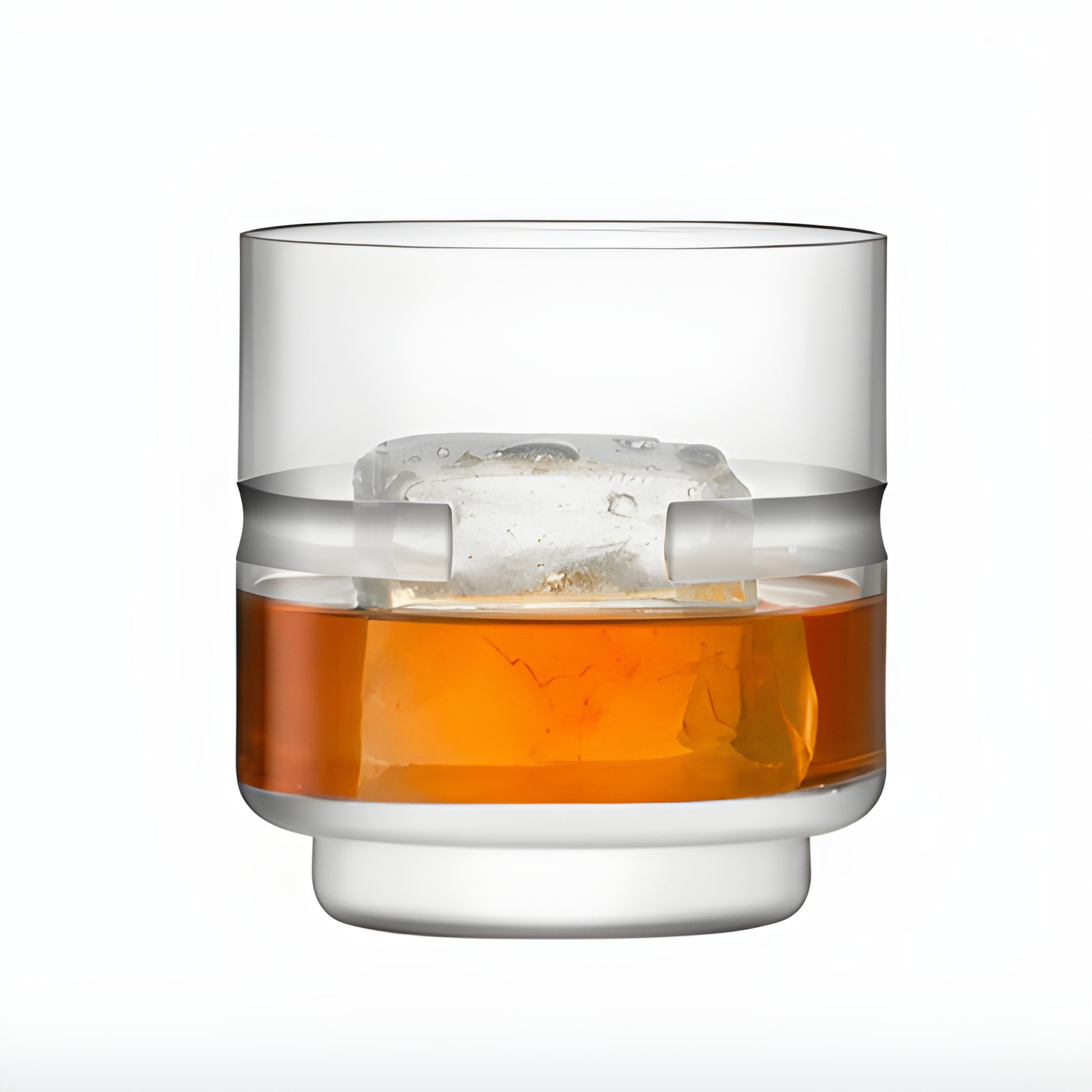 Modern whiskey glass with ice cube on white background.