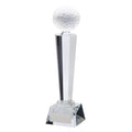Crystal golf trophy with geometric design and a golf ball on top.
