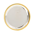 Round silver and gold salver with decorative border, 250mm for elegant serving.