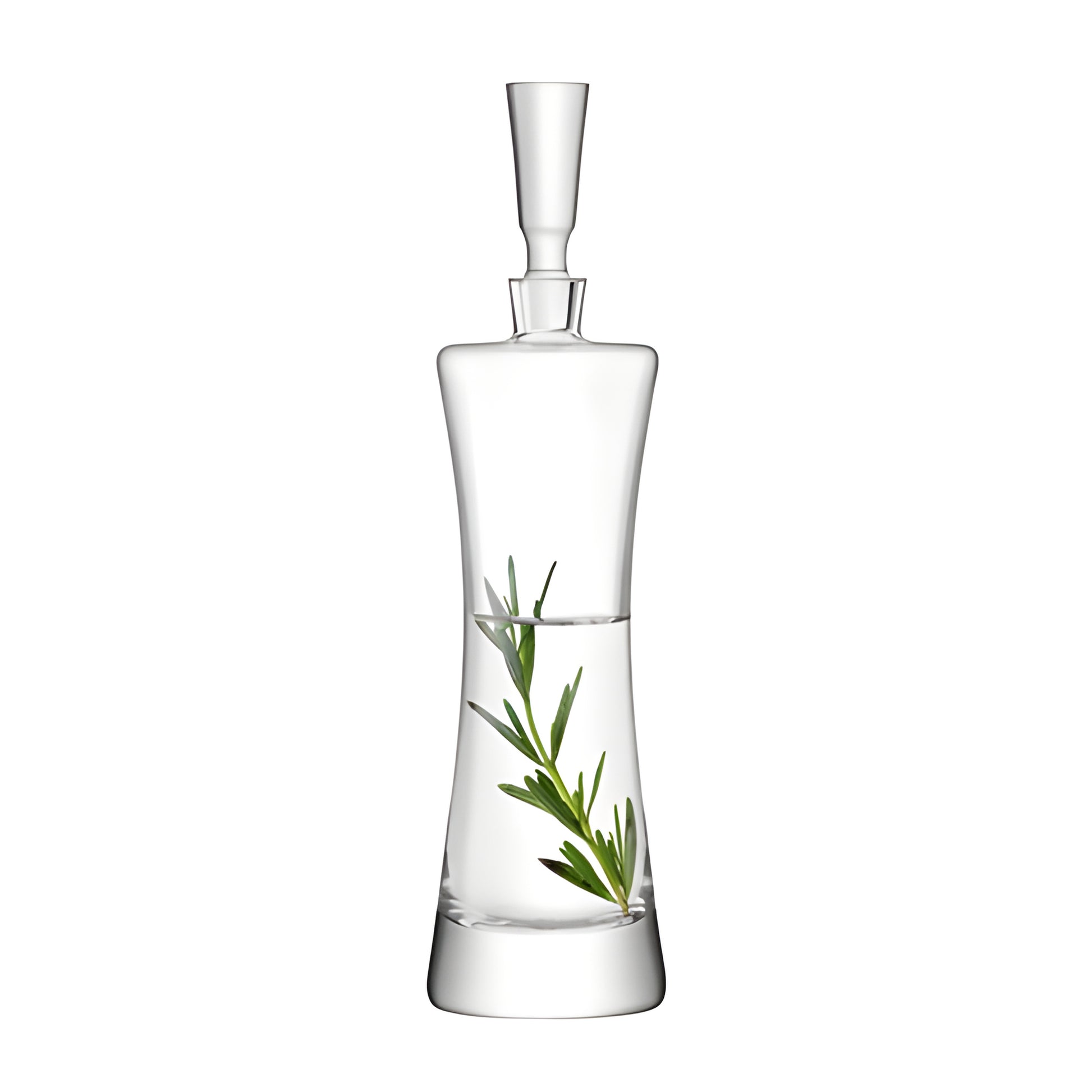 Elegant glass decanter with rosemary infusion inside.