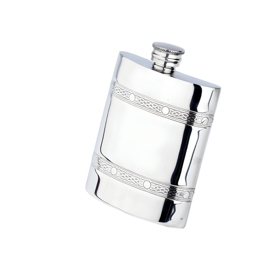 Silver 6oz flask with engraved Celtic patterns oblong shape