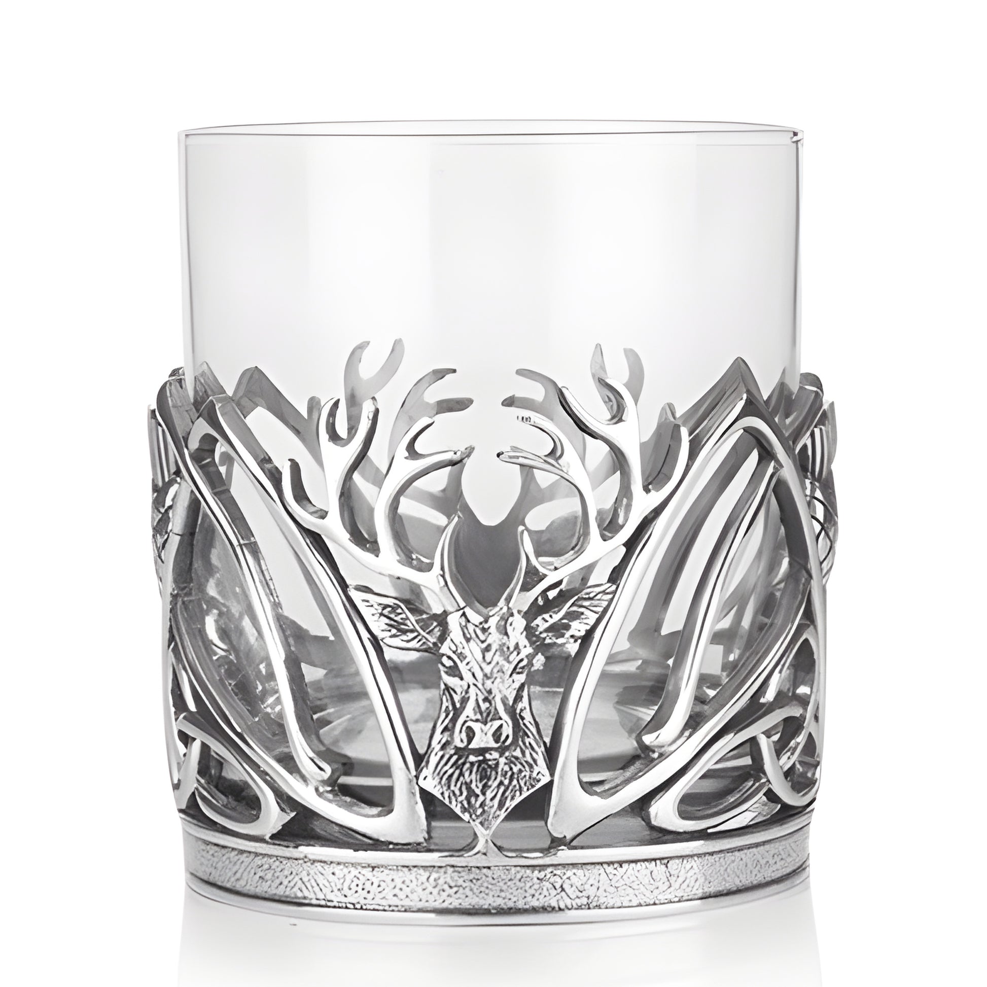 Silver stag antler whisky glass with intricate design.