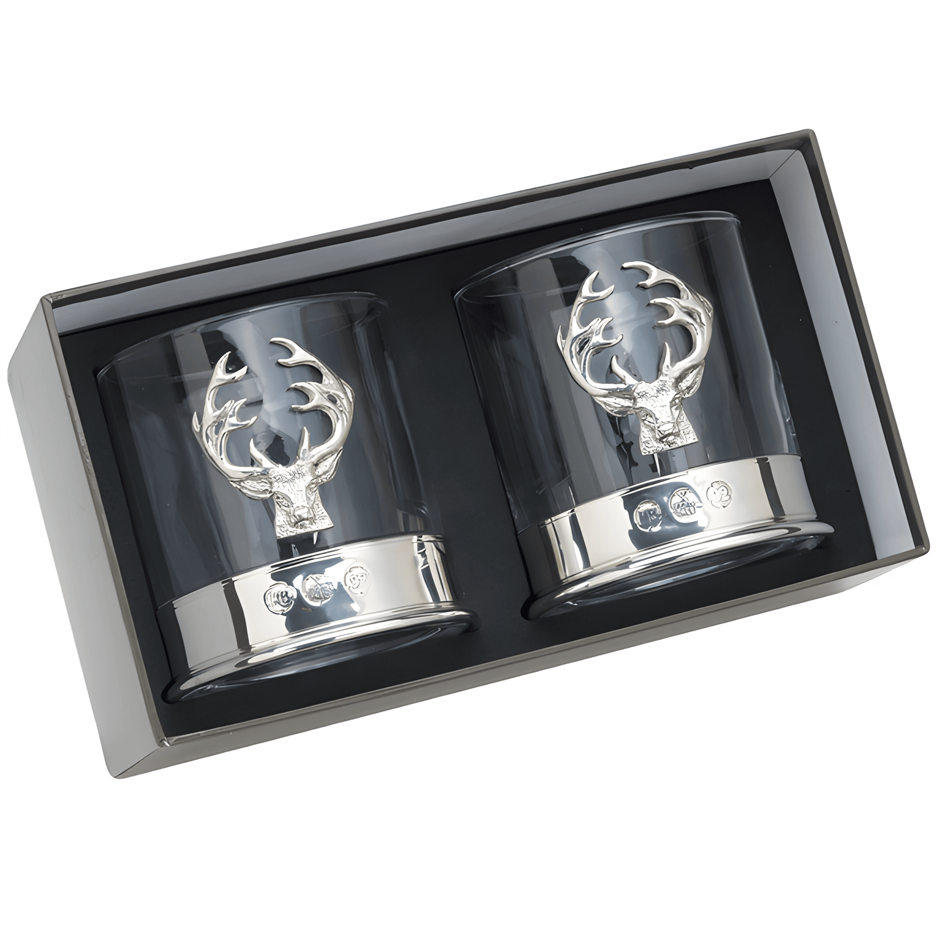 Pair of whisky glasses with silver stag head design in gift box.
