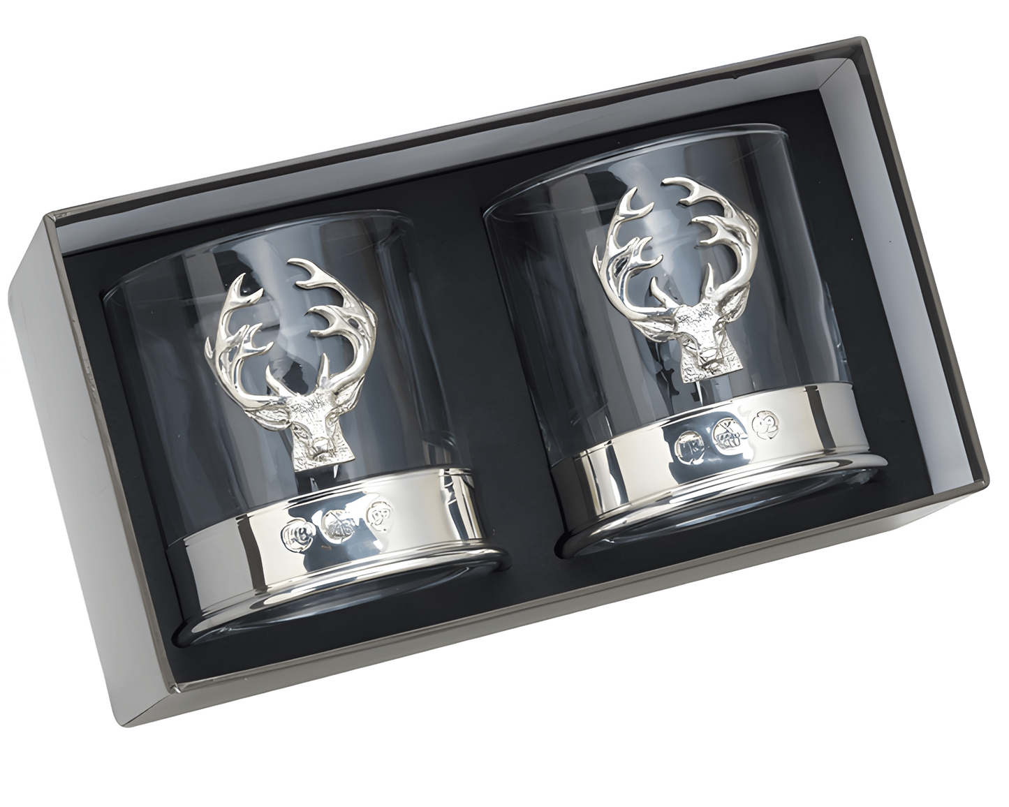 Pair of whisky glasses with silver stag head design in gift box.