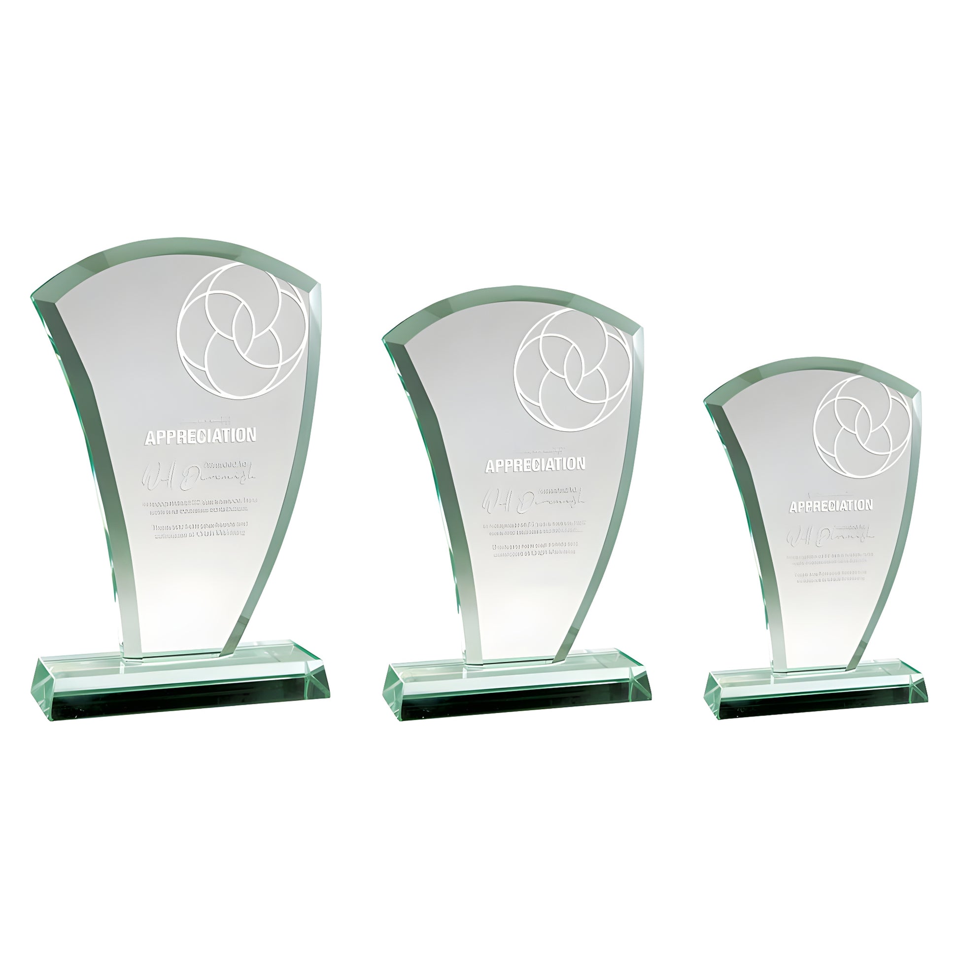 Three jade glass wave awards in varying sizes with appreciation engraving.