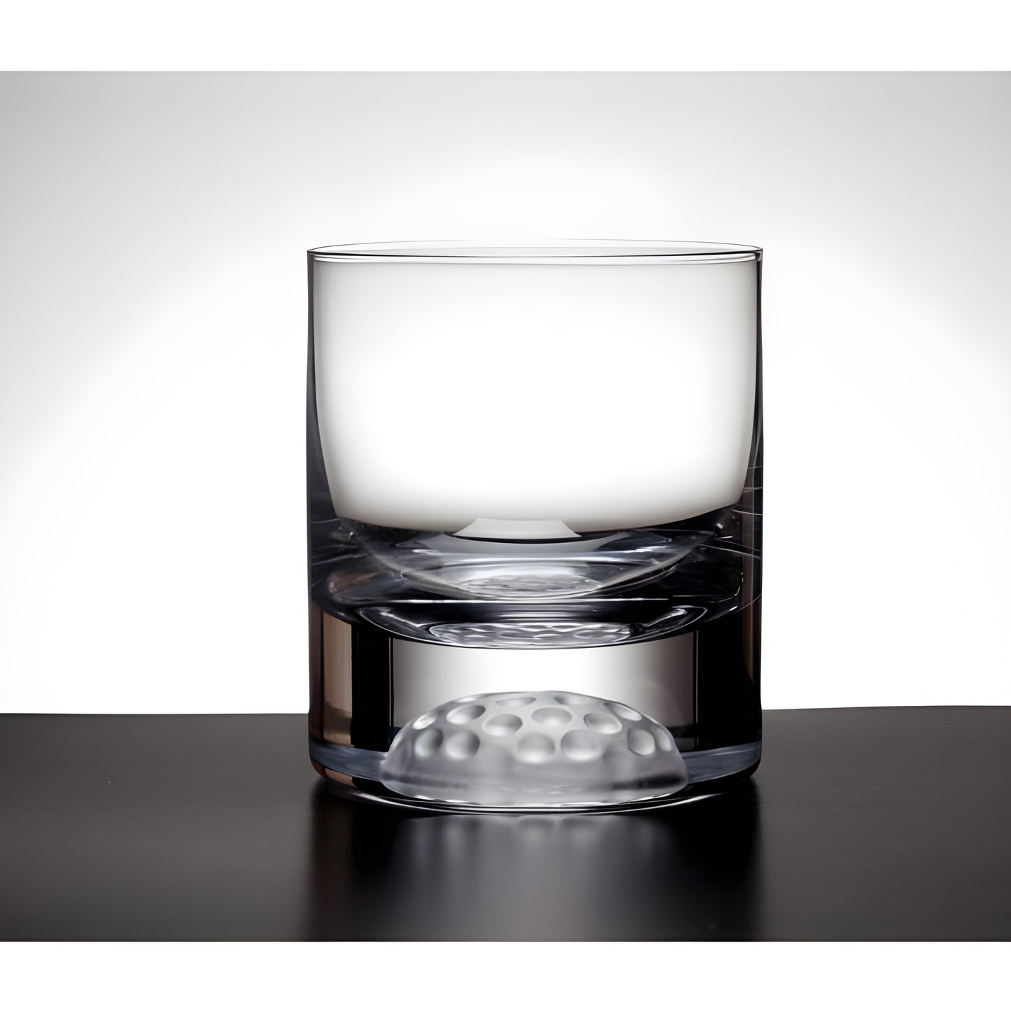 250ml glass tumbler with golf ball design at the base