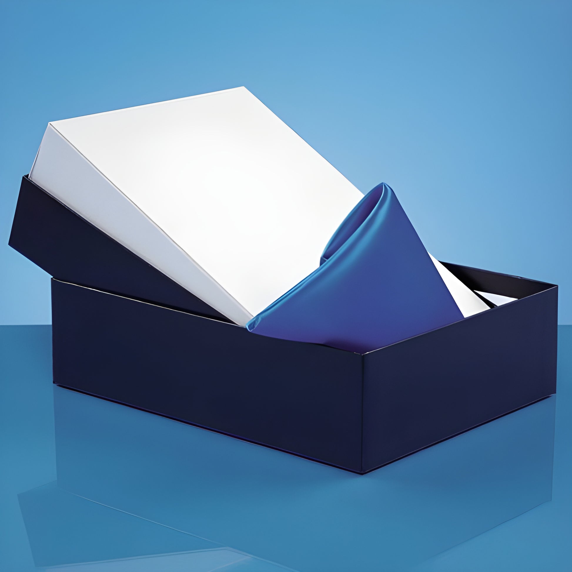 Elegant presentation box with satin lining for glass awards on blue background.