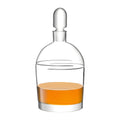Modern glass decanter with whiskey.