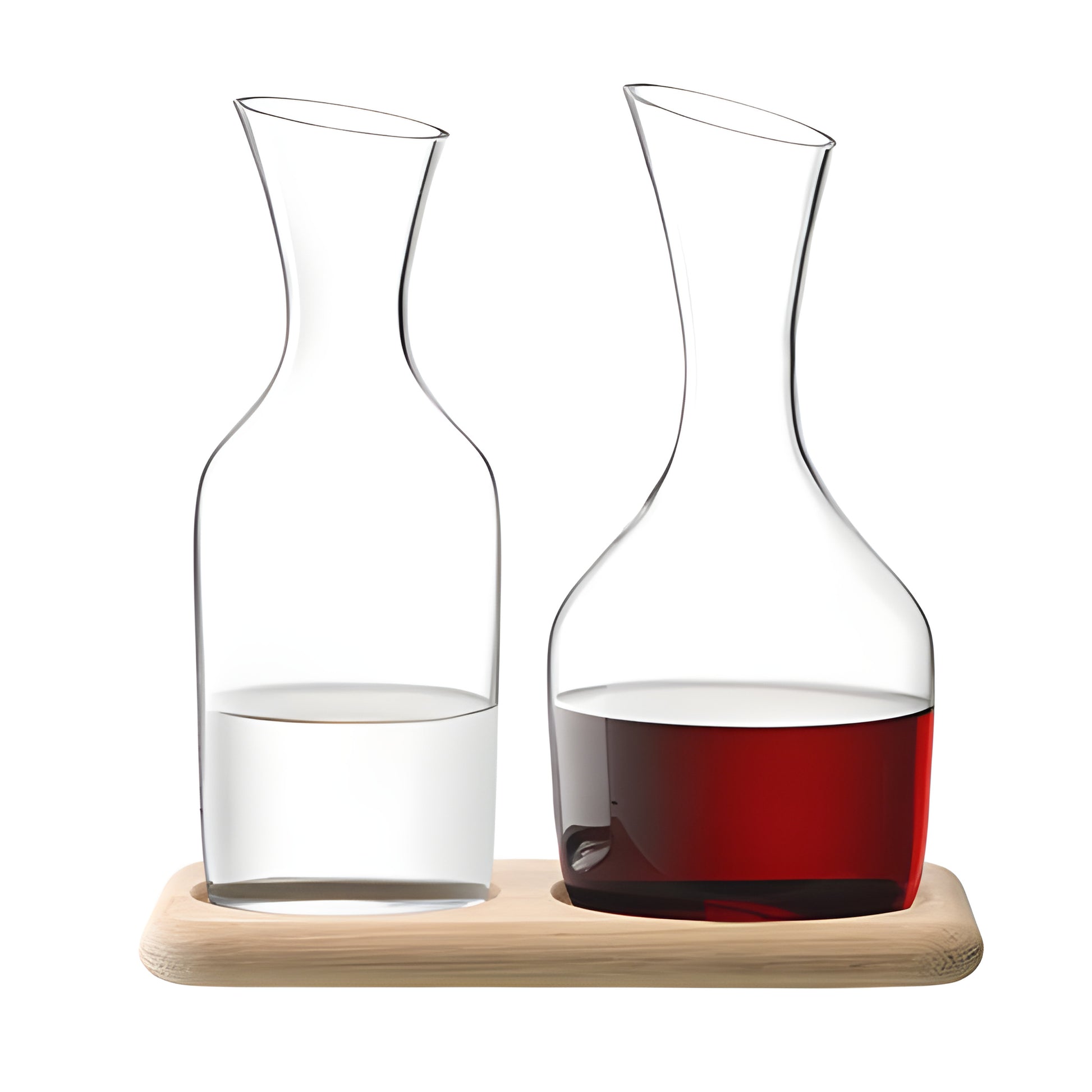 Two glass decanters, one with water and one with wine, on an oak base.