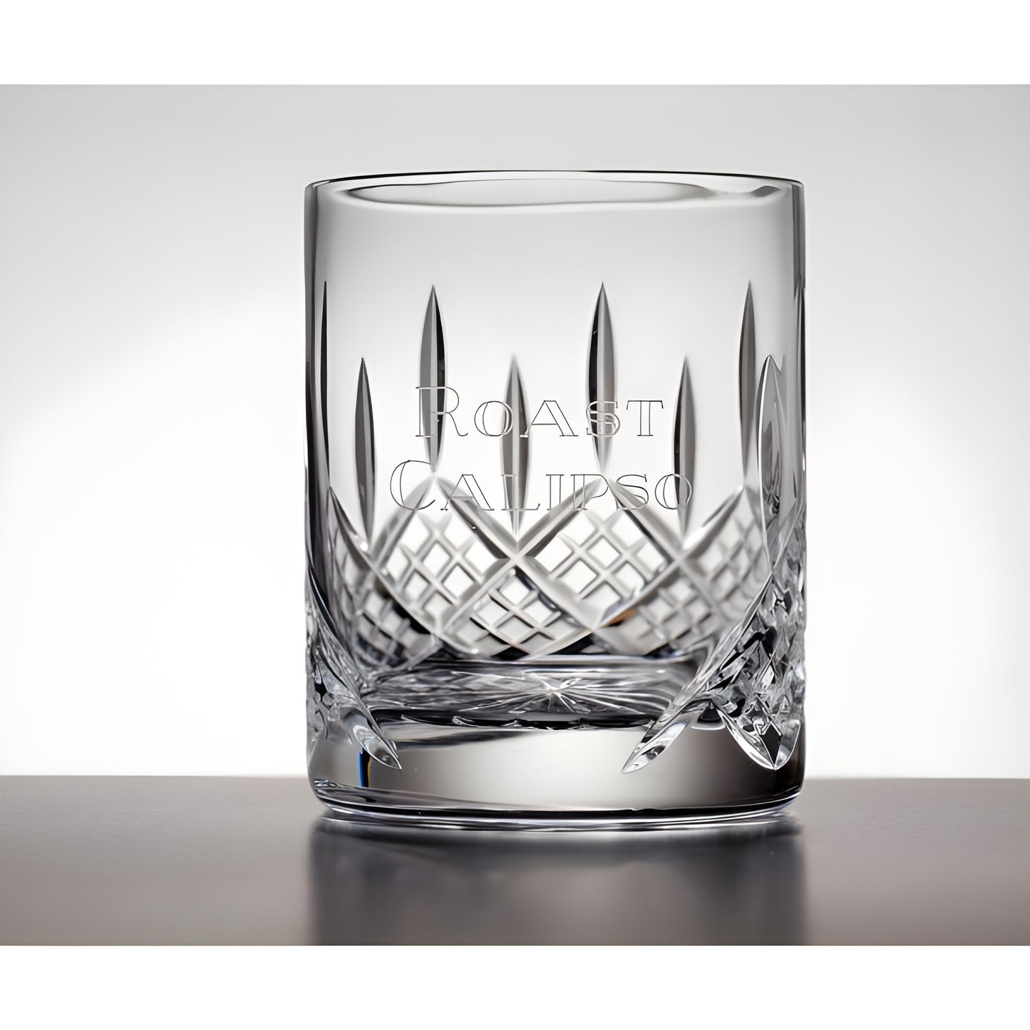 Crystal-cut whisky tumbler with panel for engraving.