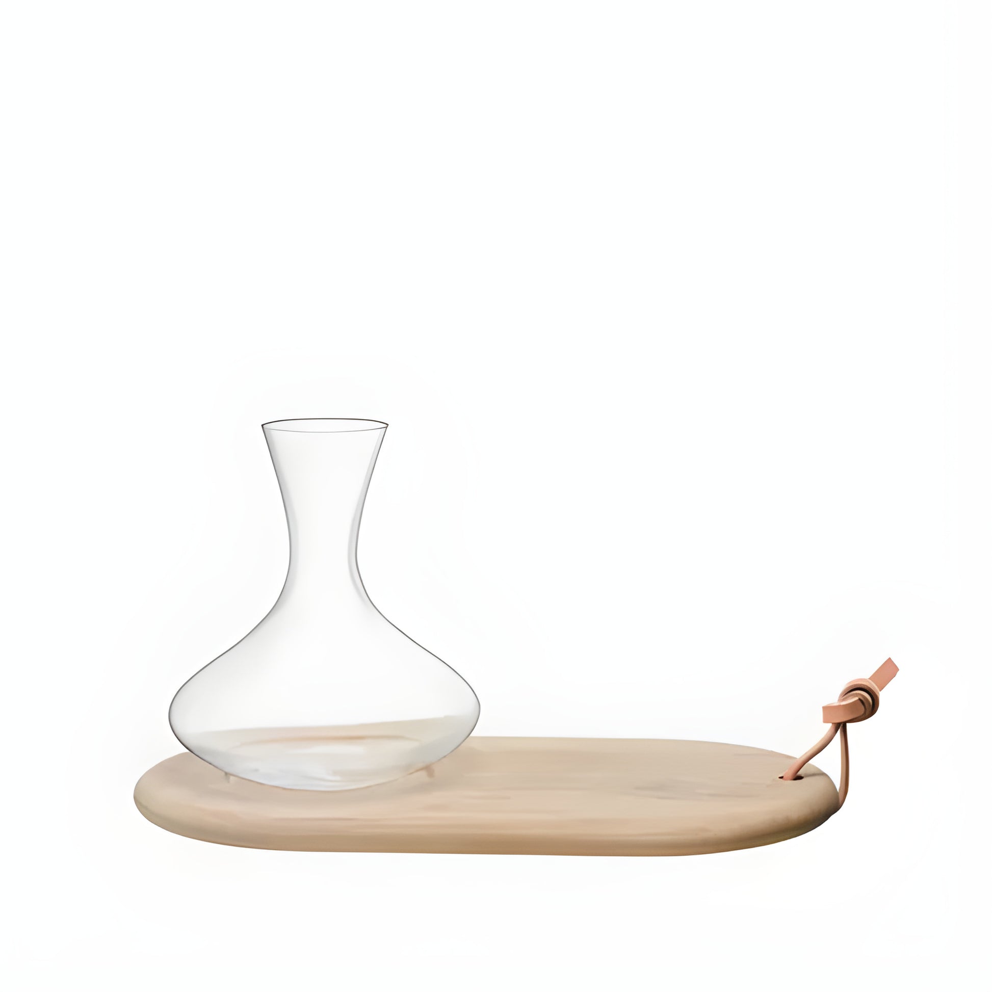 Clear glass wine carafe on an oak cheese board with leather strap.