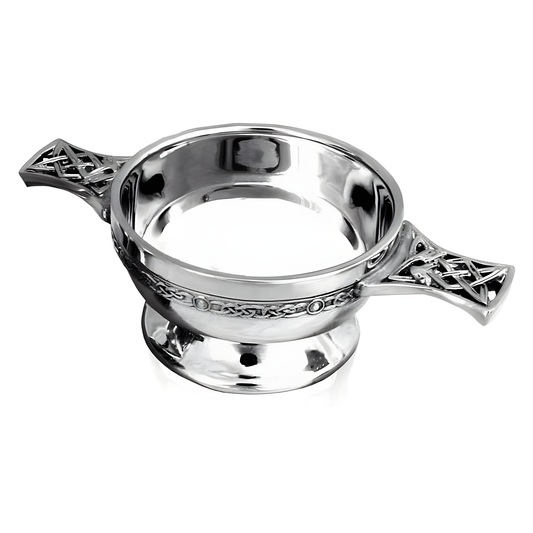 Pewter quaich bowl with Celtic design handles used in Scottish ceremonies.