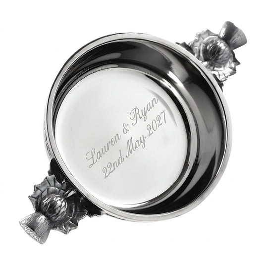 Example engraving (wedding): "Lauren & Ryan / 22nd May 2027" inside the 3" Scottish Thistle Handle Pewter Quaich Bowl