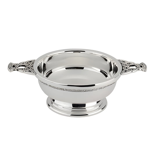 Nickel-plated 5-inch quaich bowl with Celtic design and two handles.