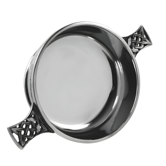 Pewter quaich bowl with Celtic knot handles, ideal as a Scottish gift.