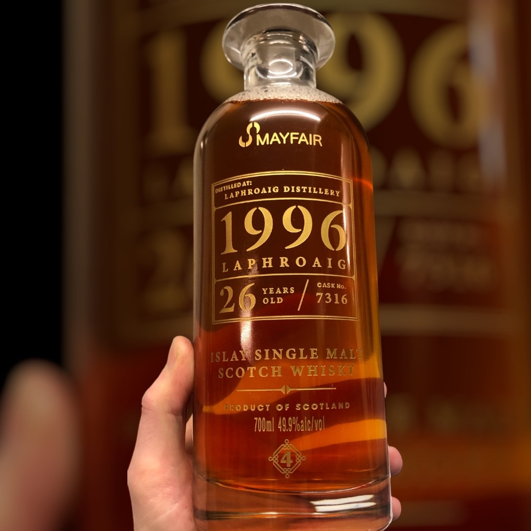 Single-cask whisky bottle with a sandblasted, gold-infilled label engraved by Walters