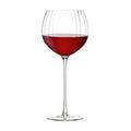 Aurelia balloon glass filled with red wine, ideal for enhanced tasting experience.