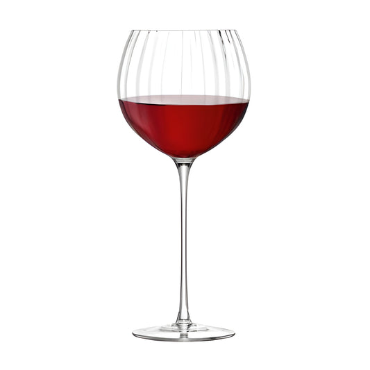 Aurelia balloon glass filled with red wine, ideal for enhanced tasting experience.