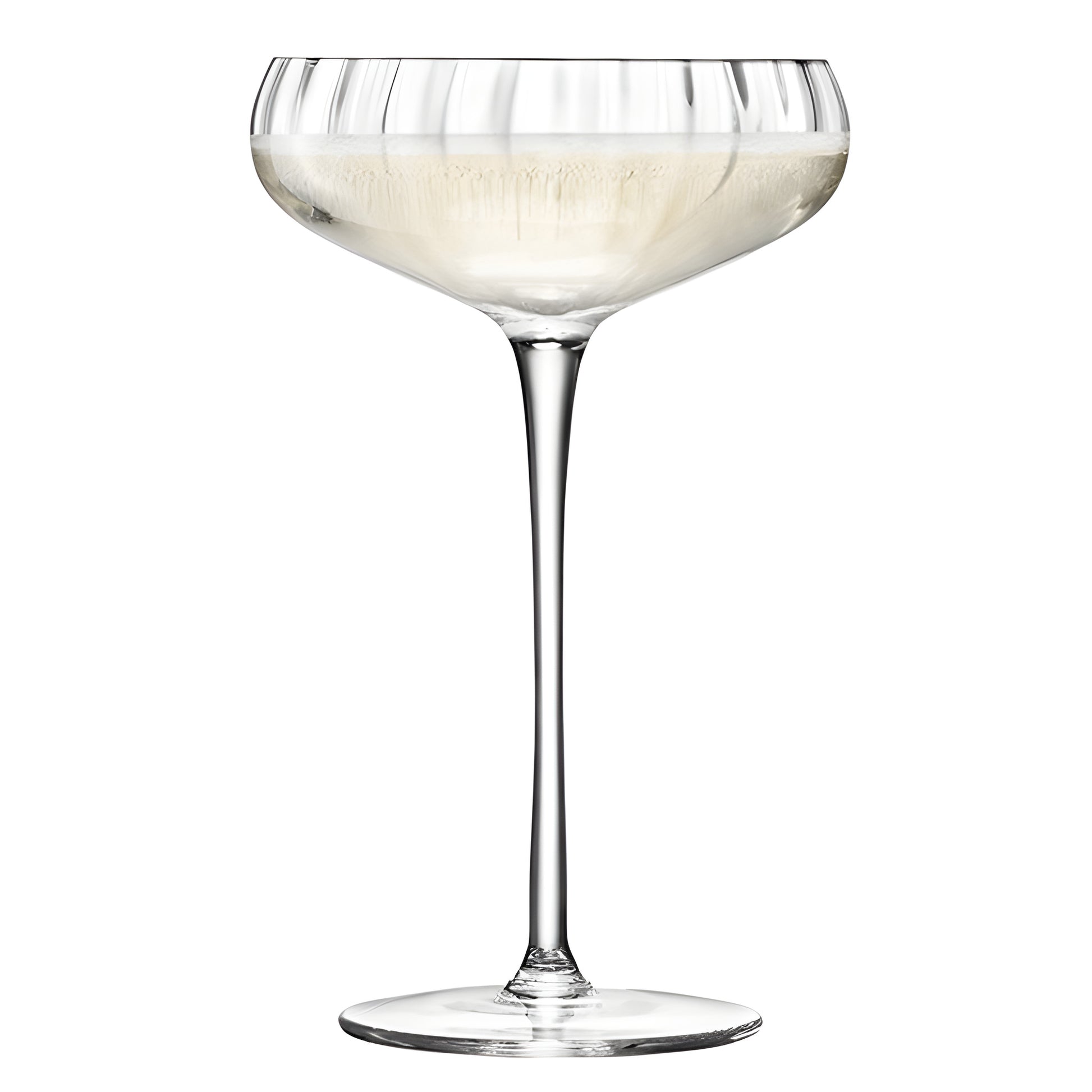 Elegant champagne saucer glass filled with sparkling wine