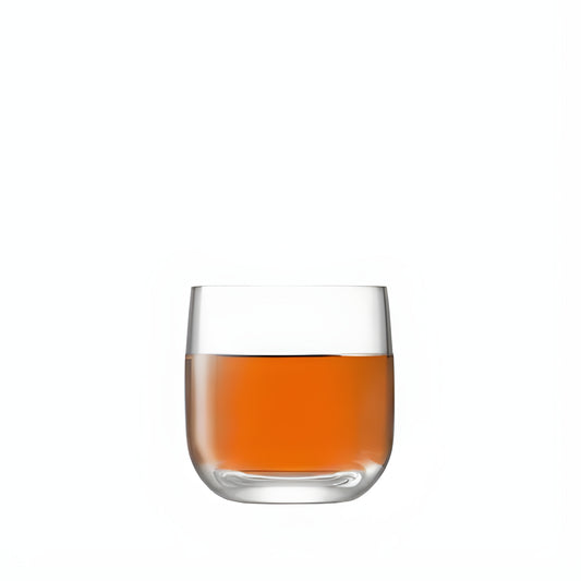 75ml clear shot glass filled with orange liquid on white background
