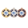Gold, silver, and bronze award medals with crest design