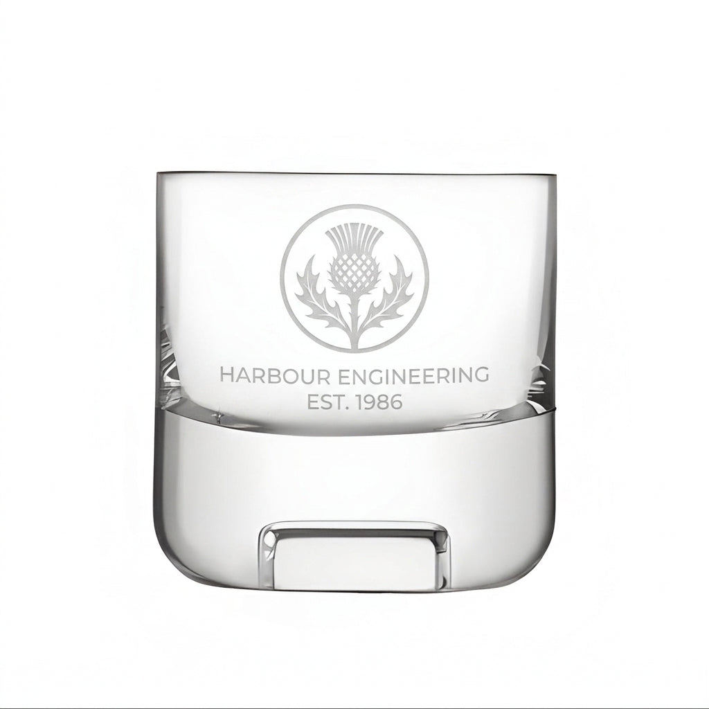 Example company logo sandblasted on a whisky glass