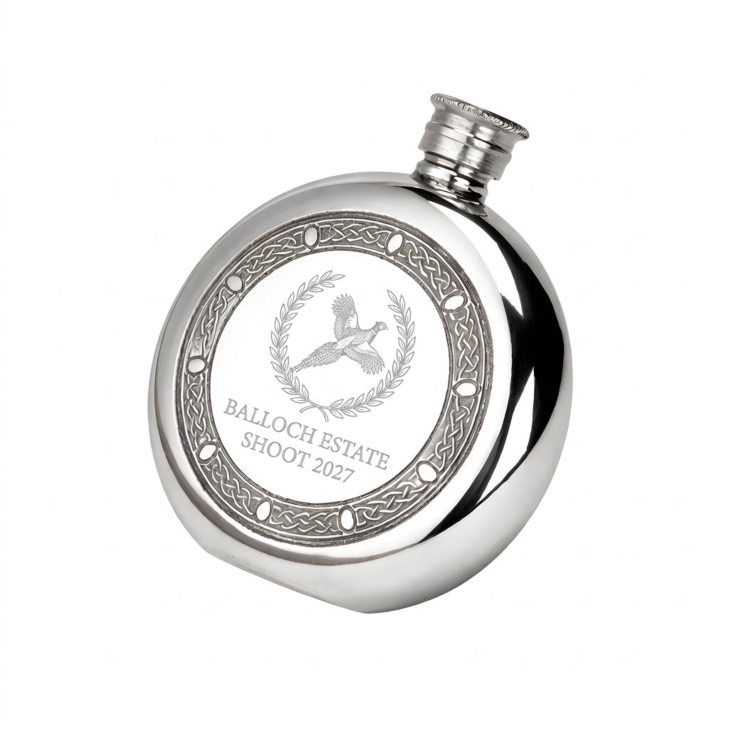 Example engraving (crest): "BALLOCH ESTATE / SHOOT 2027" on the Celtic Frame Round Hip Flask 6oz