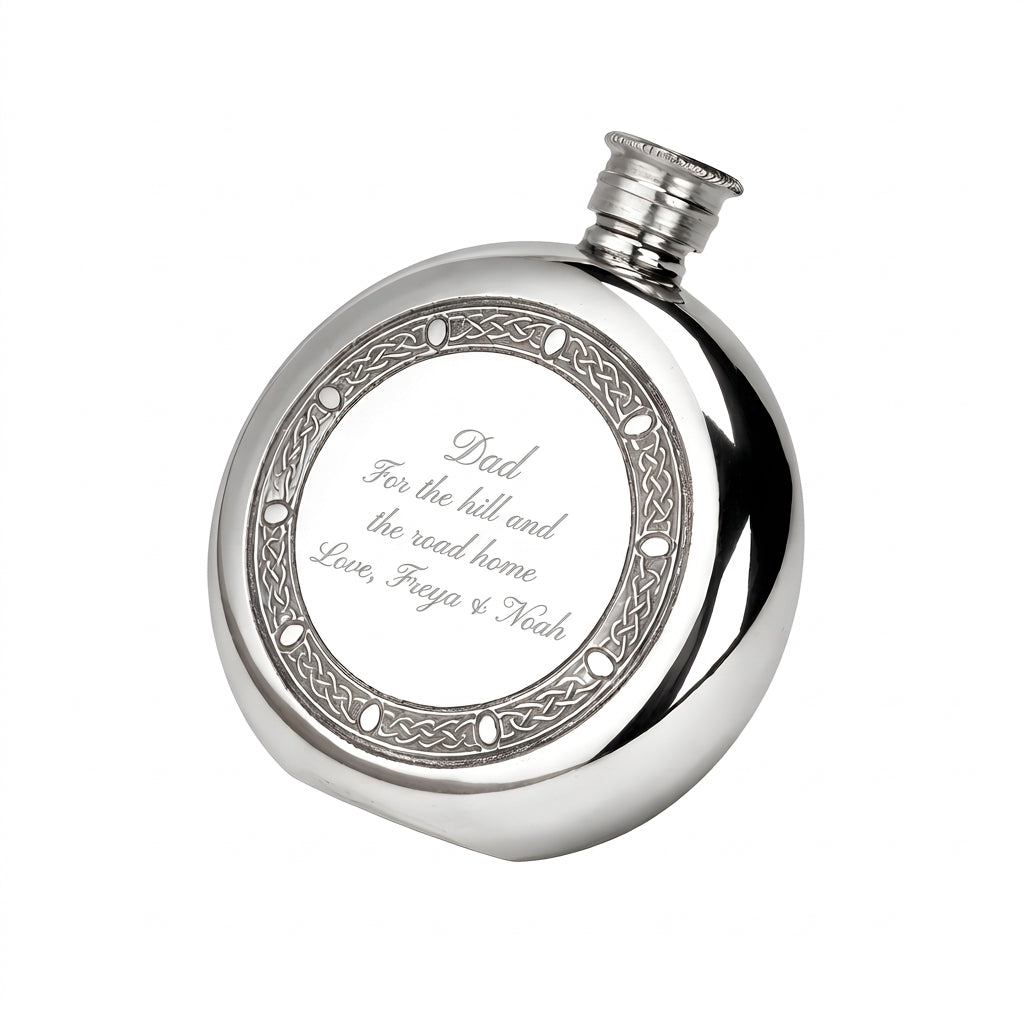 Example engraving (gift for dad): "Dad / For the hill and the road home / Love, Freya & Noah" on the Celtic Frame Round Hip Flask 6oz