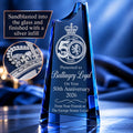 Example engraving on the Cobalt Blue Crystal Summit Award: a club crest and 50th anniversary message sandblasted into the glass with a silver infill
