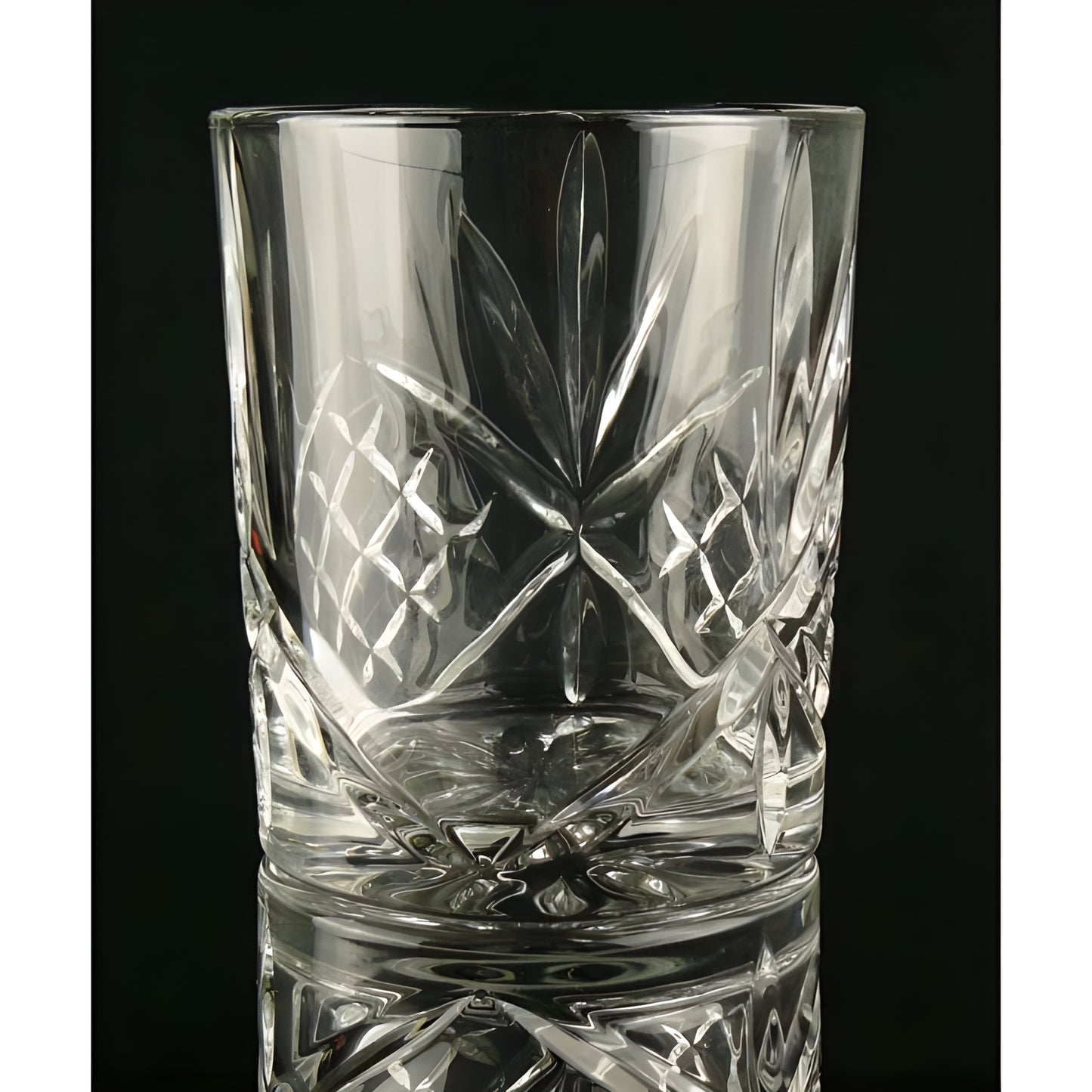 Crystal clear dublin cut whisky glass with patterned design.