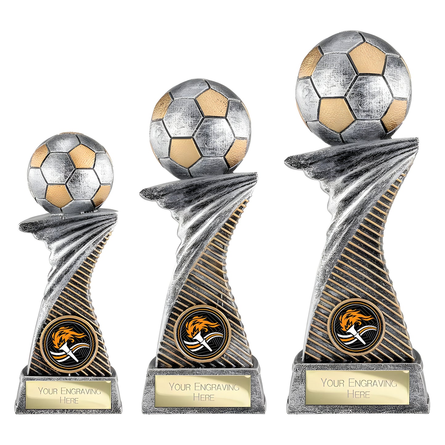 Antique silver and gold football trophies with engraving plaques.