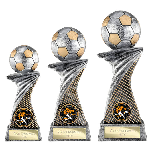 Antique silver and gold football trophies with engraving plaques.
