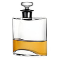 Modern glass flask decanter with whiskey inside
