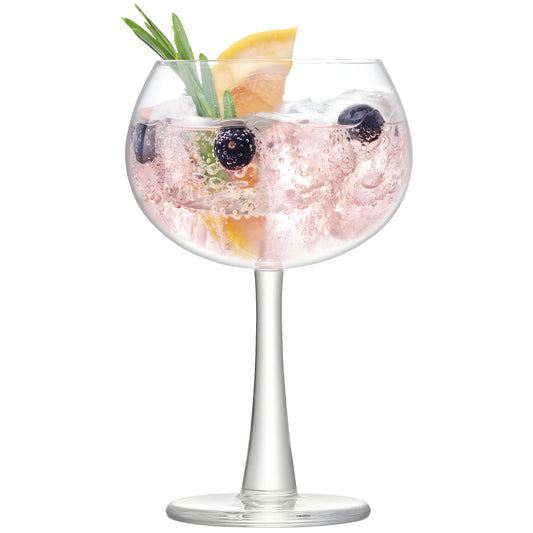 420ml gin glass with pink gin tonic, rosemary, blueberries, and lemon slice.