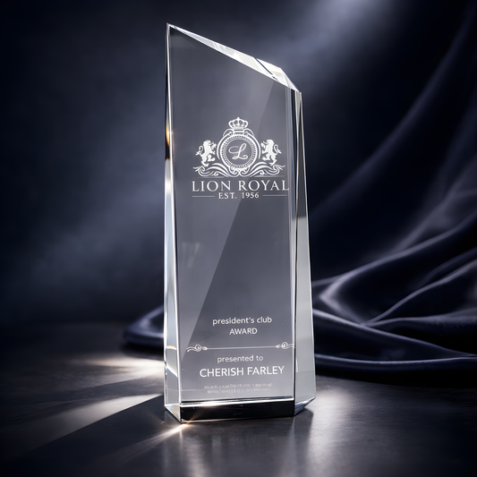 Elegant engraved crystal award for President's Club presented to Cherish Farley.